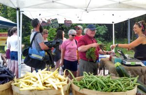 Happy Shoppers at the Durham Farmers' Market at the Churchill Rink lot in Jackson Landing